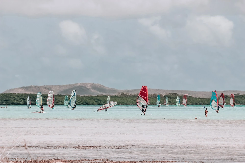 Lac Bay in Bonaire is perfect for windsurfing. Here you can find plenty of water activities and other things to do in Bonaire on a cruise or on a longer stay. 