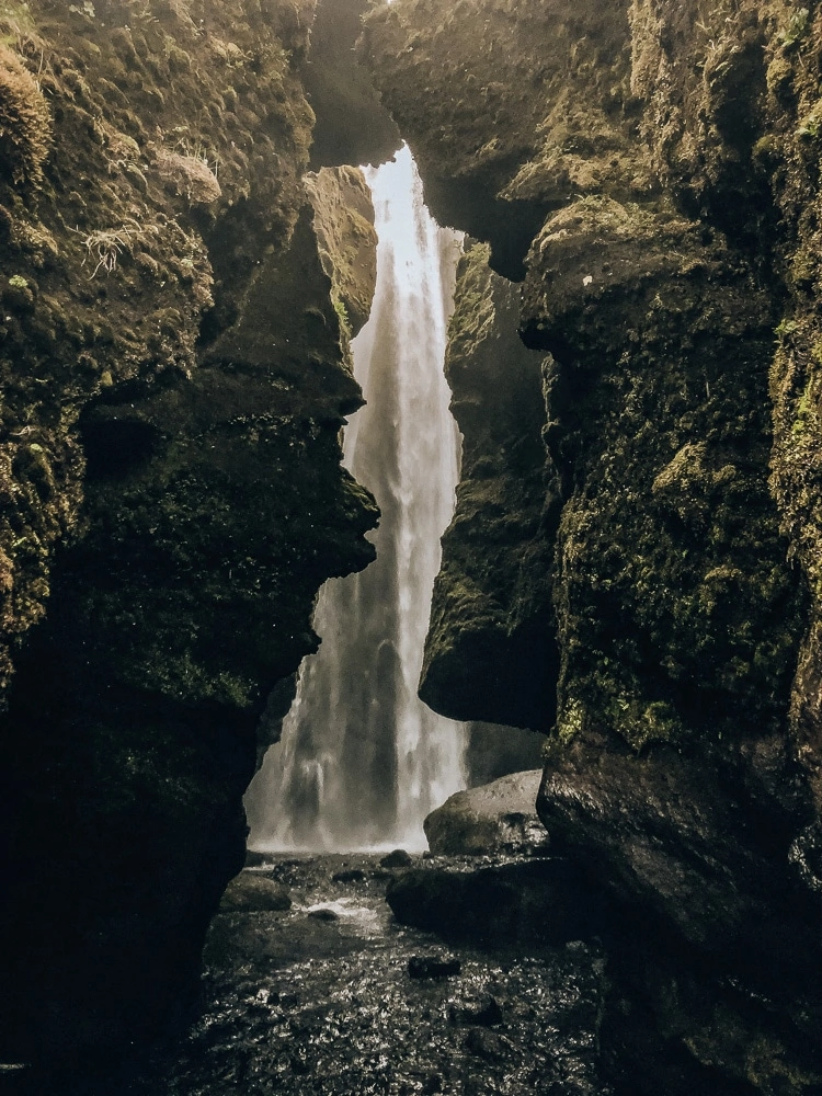 Looking into the canyon at Glujfrabui waterfall in Iceland. Find the top 5 waterfalls in Iceland that you don't want to miss on a Ring Road road trip. 