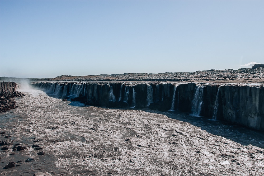 Selfoss Waterfall in northern Iceland from east side of the canyon. Find the top 5 waterfalls in Iceland that you don't want to miss on a Ring Road road trip. 