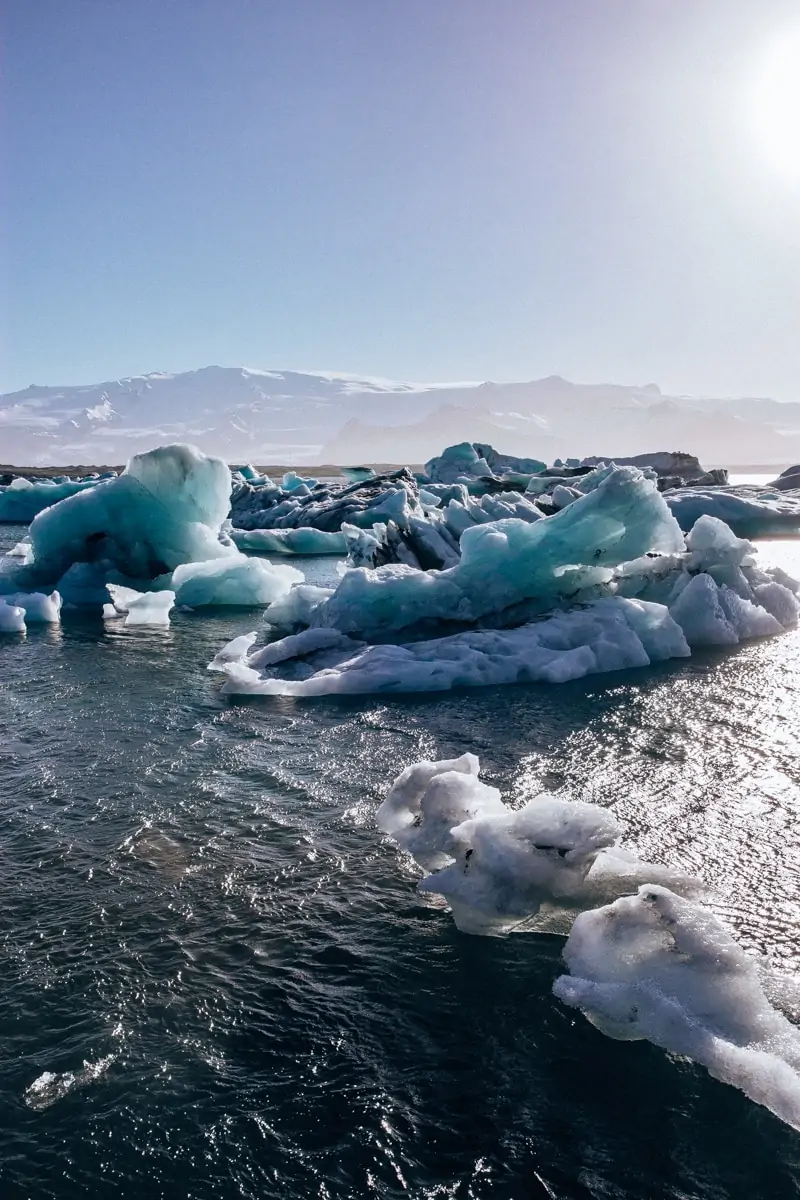 Pieces of ice floating in Jokulsarlon Glacier Lagoon in Iceland in summer. Find an Iceland itinerary for a week in Iceland here.