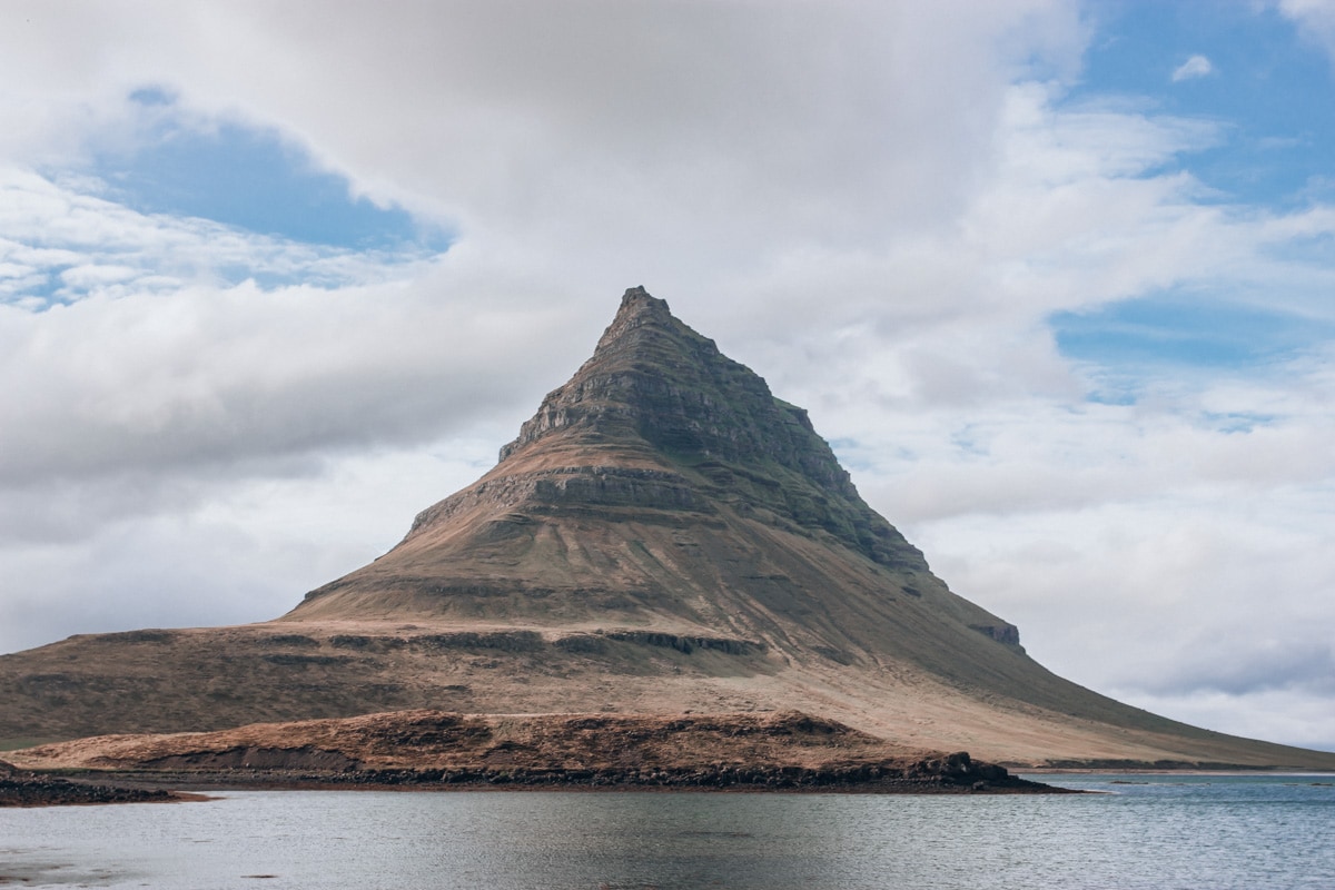 Kirkjufell Mountain in Iceland in summer. Get the perfect Ring Road itinerary for 6 days in Iceland here.