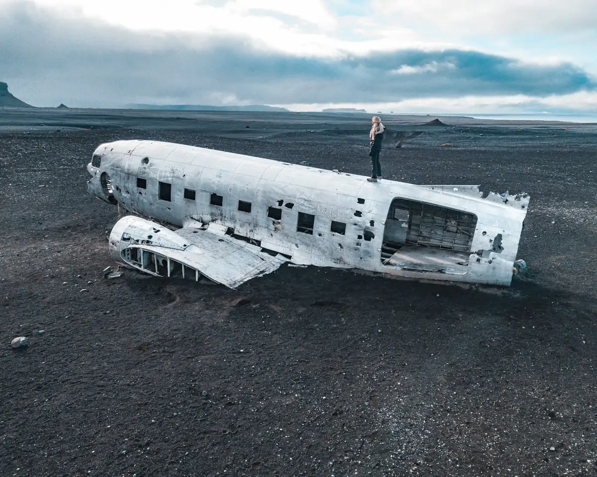 Solheimasandur DC-3 Plane Wreck on the black sand beach in Iceland near Vik. Check out our perfect 6 day itinerary for Ring Road in Iceland!