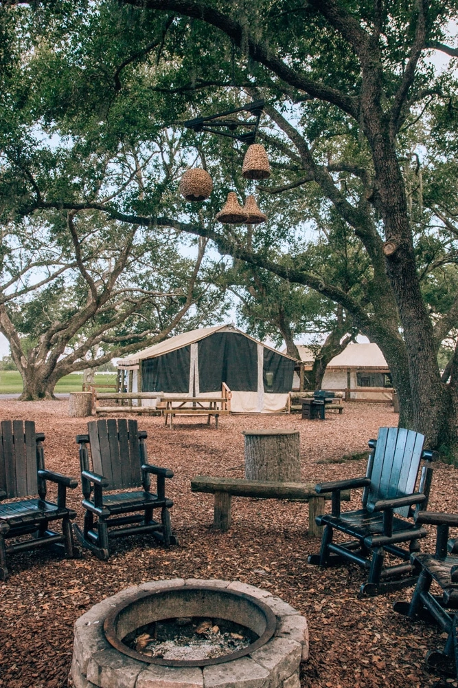 Glamping tent and fire pit at Westgate River Ranch