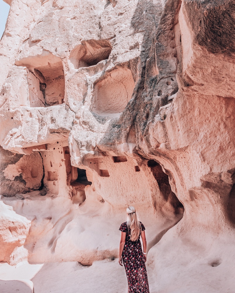 Walking through the cave churches in Fairy Chimney Valley or Pasabagi. Find out full 3 day Cappadocia itinerary here with all the perfect photo spots!