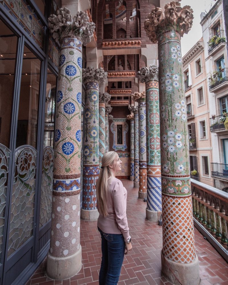 The balcony and beautiful tiled columns at Palau de la Musica in Barcelona is a perfect spot for photos. Get our full guide to Barcelona's most Instagrammable places with a 3 day itinerary here.