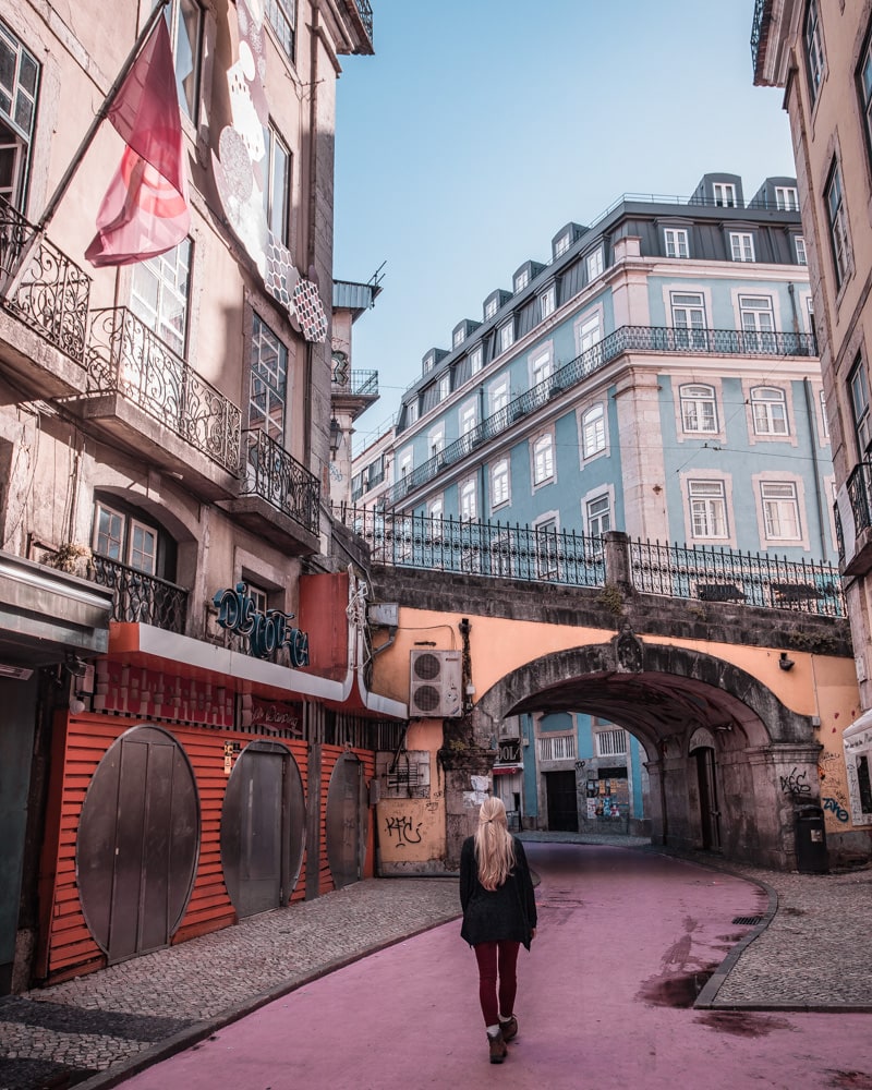 The Instafamous Pink Street in Lisbon. Click here for Lisbon's most Instagrammable places with a free map to plan your trip to Lisbon!