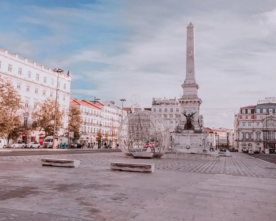 Praca dos Restauradores at Christmas. Find all of Lisbon's best photo locations here plus a free map to plan your trip to Lisbon.