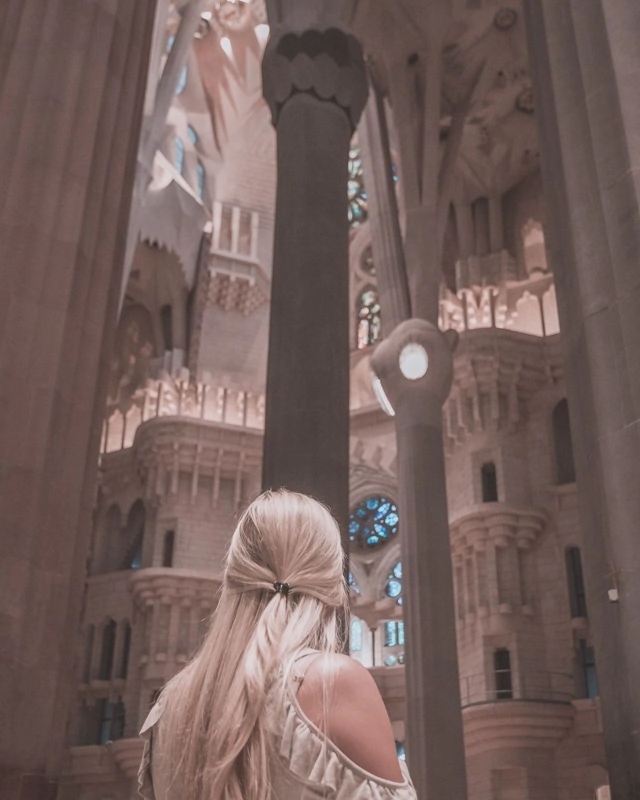 Taking in the interior of Sagrada Familia in the evening - the perfect time to visit (make sure to get tickets ahead of time!). Get our full Barcelona travel guide and itinerary for 3 days in Barcelona here.
