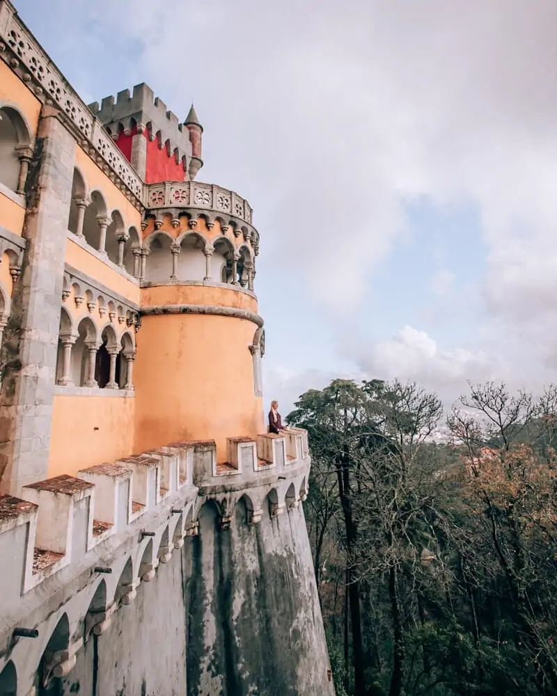 Woman at Pena Palace in Sintra, Portugal as part of a Sintra one day itinerary
