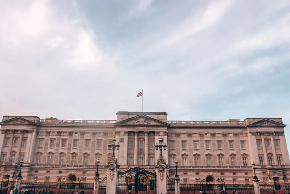 The beautiful Buckingham Palace and famous balcony early on a winter morning. Find the perfect 3 day itinerary for London with Instagrammable places to see, places to eat, and places to stay.