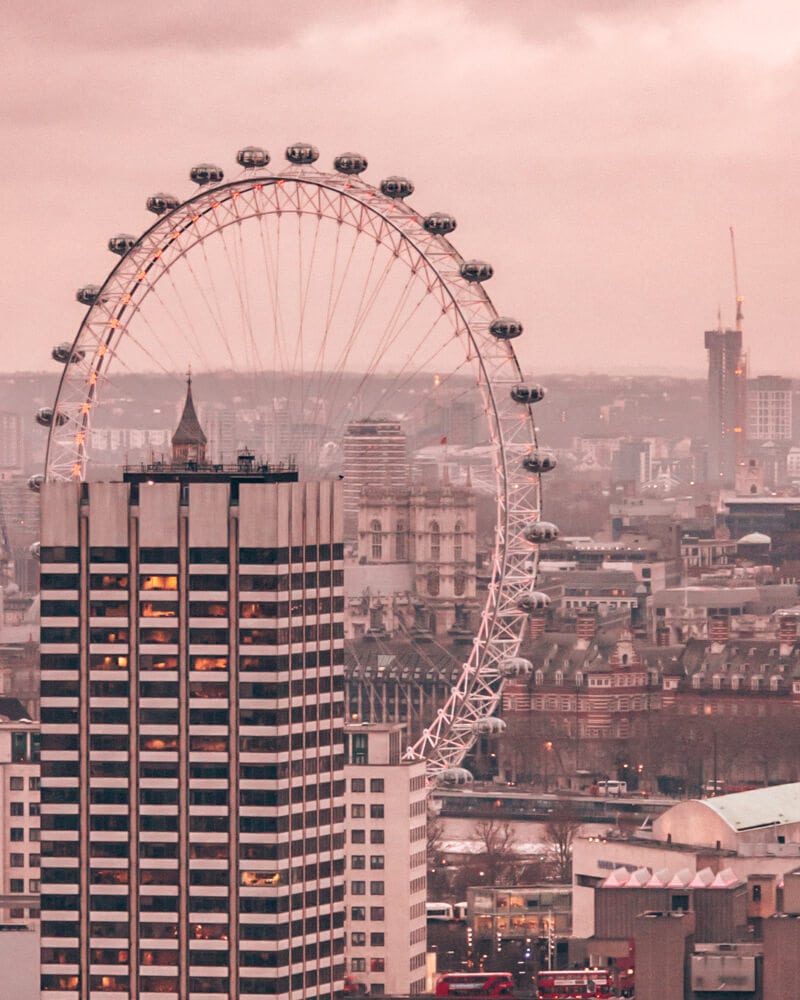 View of the London Eye from the dome at St. Paul's Cathedral near sunset. Get all the best London things to do in this itinerary for 3 days in London.