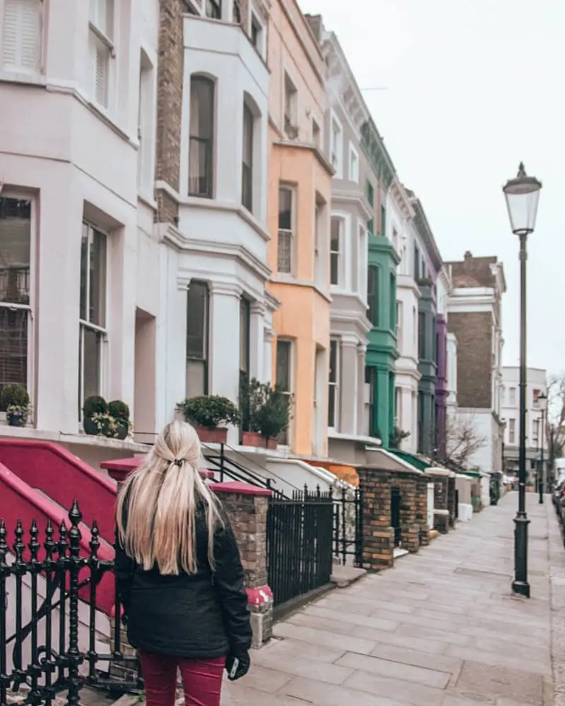A colorful row of houses in Notting Hill in London. Click here for the best Instagram photo spots in London including the best streets in Notting Hill.