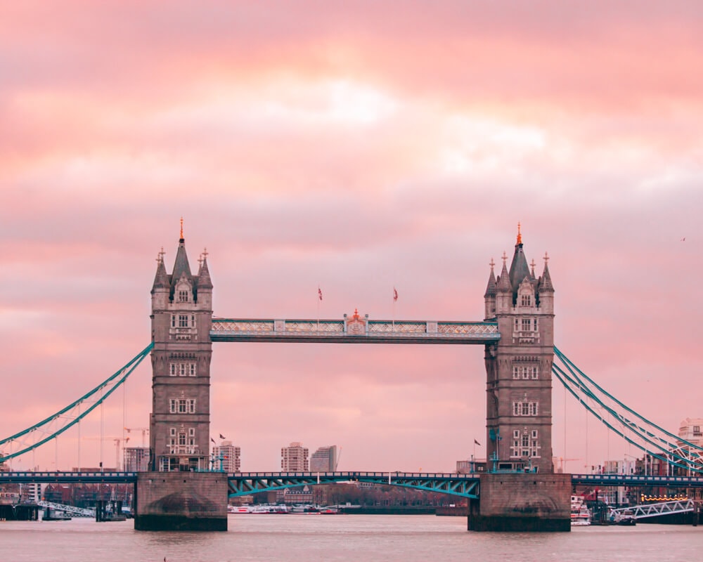 Tower Bridge at sunrise taken from London Bridge. Get all the best London travel tips in this 3 day London itinerary (including the best photo spots in London)