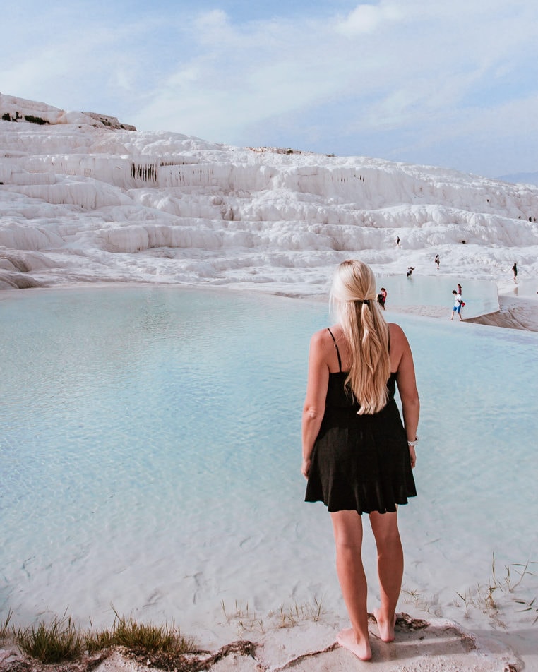The middle pools around 8:30 a.m. as the tours pour in. The Ultimate Guide to Visiting Pamukkale gives you all the information you need about what you can really expect, when to go, where to stay, and more.