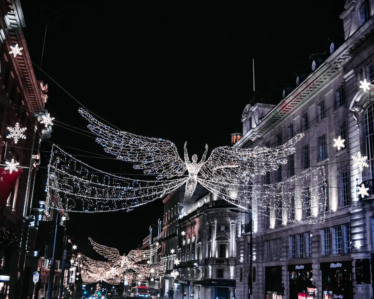 Angels made of Christmas lights near Piccadilly Circus at Christmas.