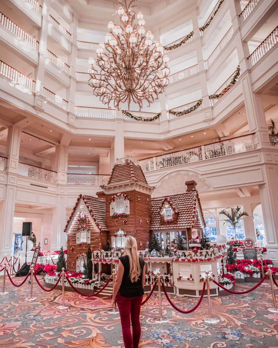 The 14-foot tall gingerbread house in the lobby of the Grand Floridian at Christmas