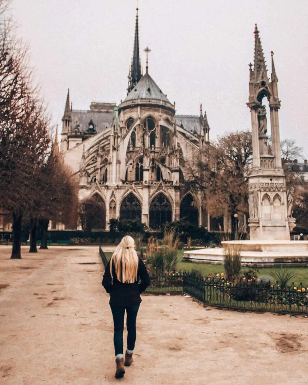 The back of Notre Dame features the flying buttresses. Get all the best Paris winter travel tip in this guide to New Year's in Paris.
