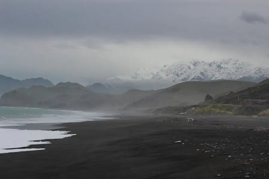 A black sand beach on the east coast the South Island in New Zealand