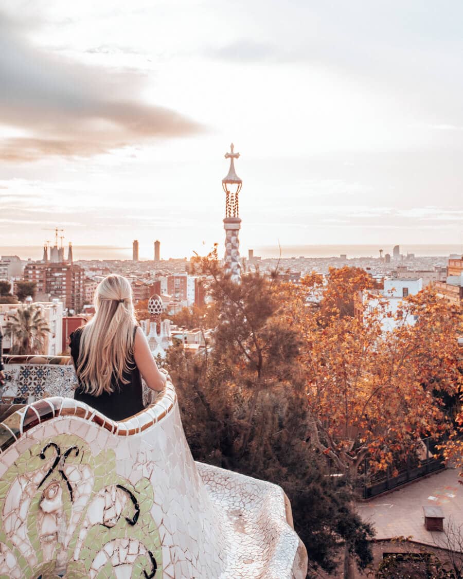 A woman looking out at Barcelona from the Greek Theater in Park Guell Monumental Zone