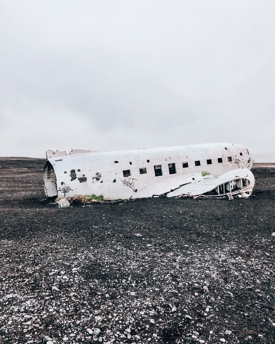 The Sólheimasandur plane wreck on a black sand beach in Iceland
