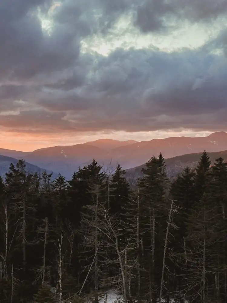 sunset on Kancamagus Highway in New Hampshire in winter