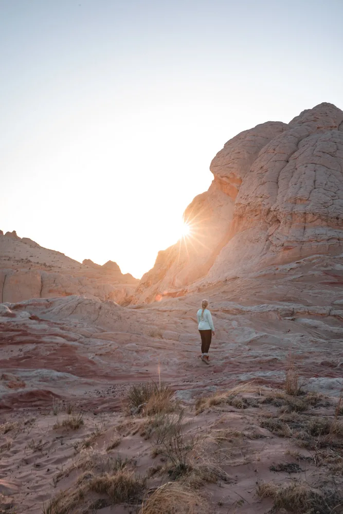 woman at sunset at white pocket arizona