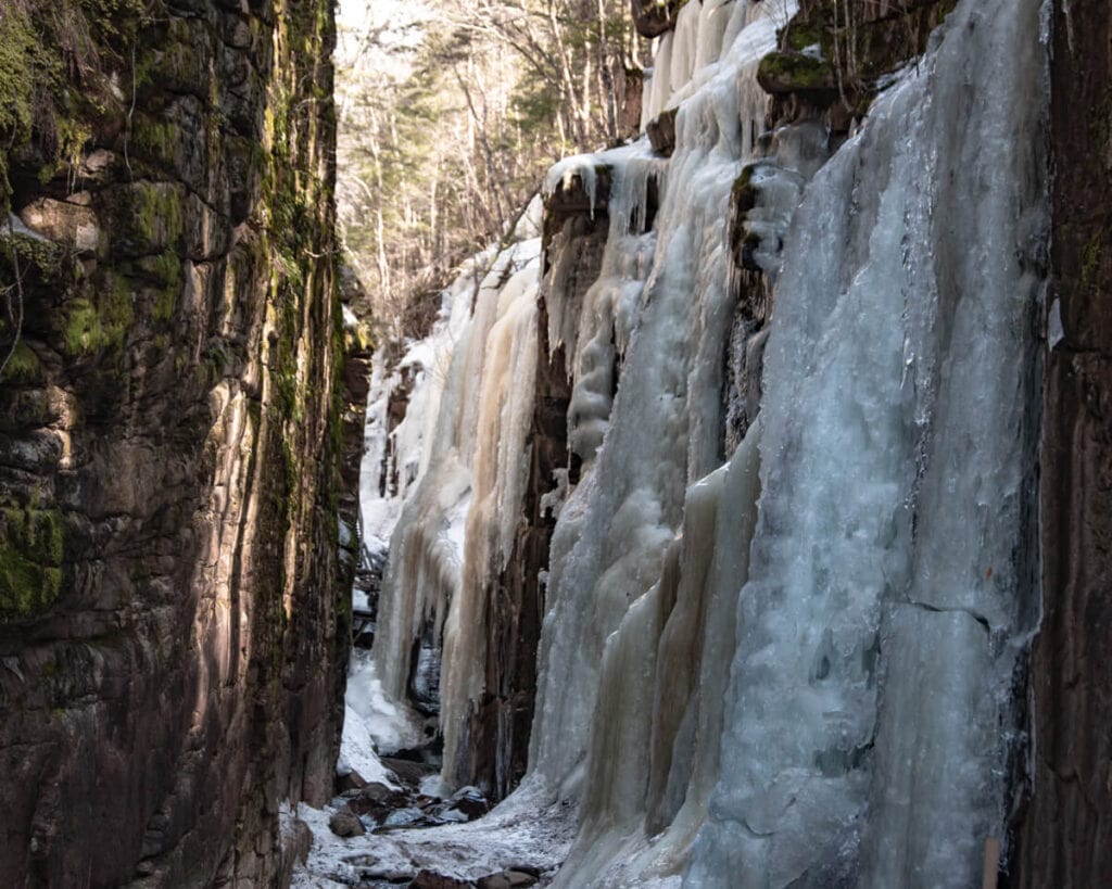 avalanche falls frozen in flume gorge in winter