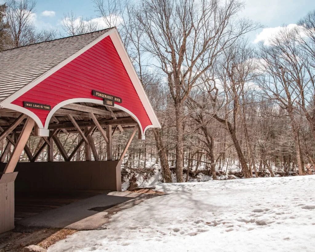 flume covered bridge with snow in franconia notch state park