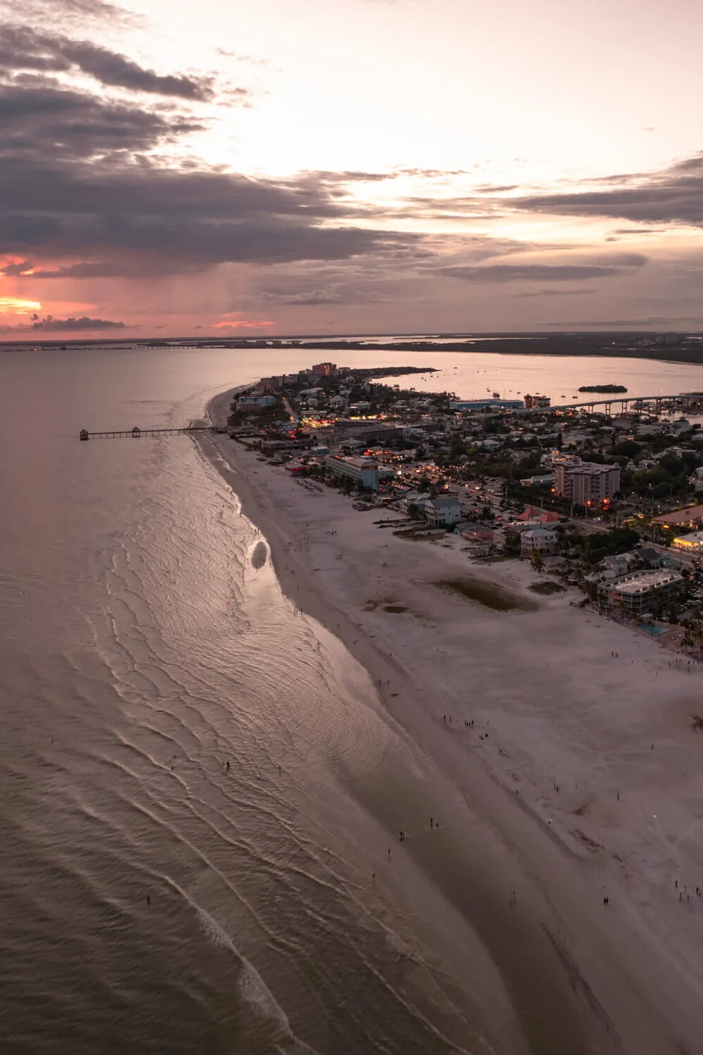 Drone shot of Fort Myers Beach Pier at sunset