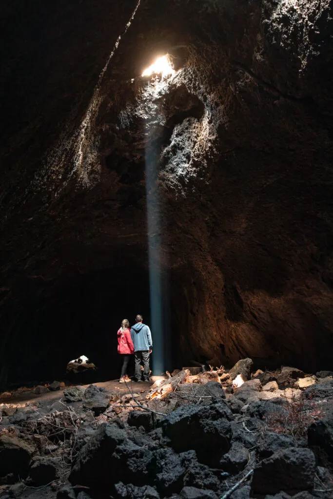 Couple in skylight cave oregon