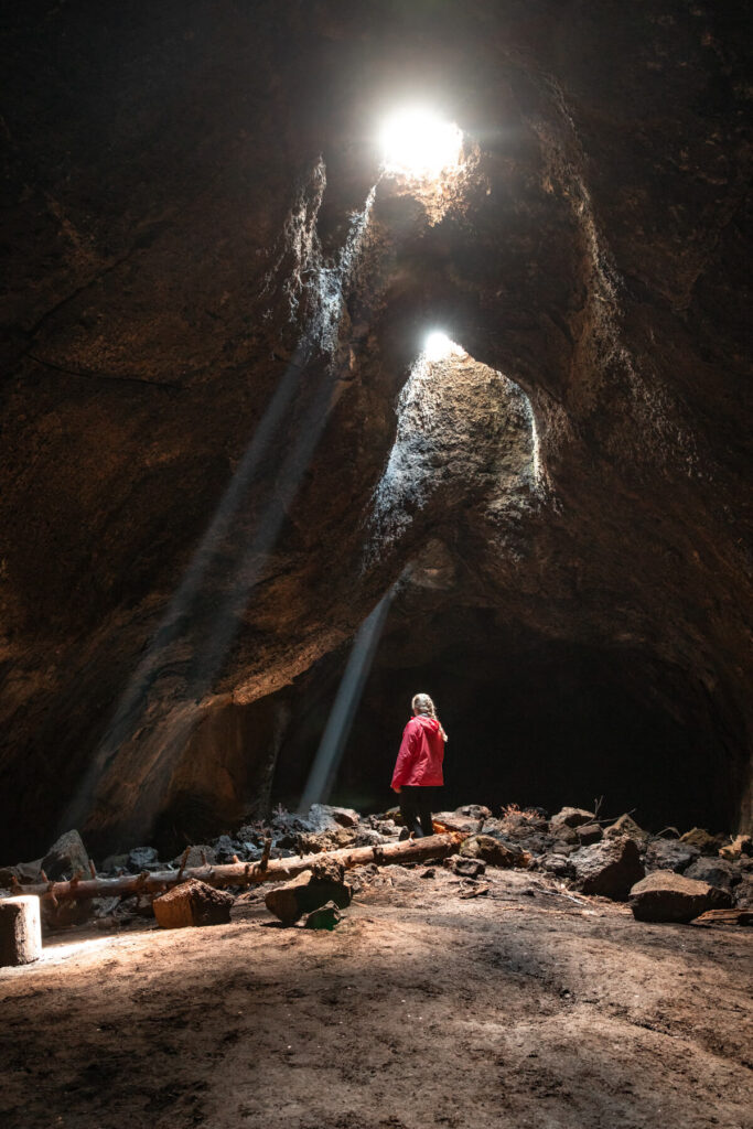 woman in skylight cave