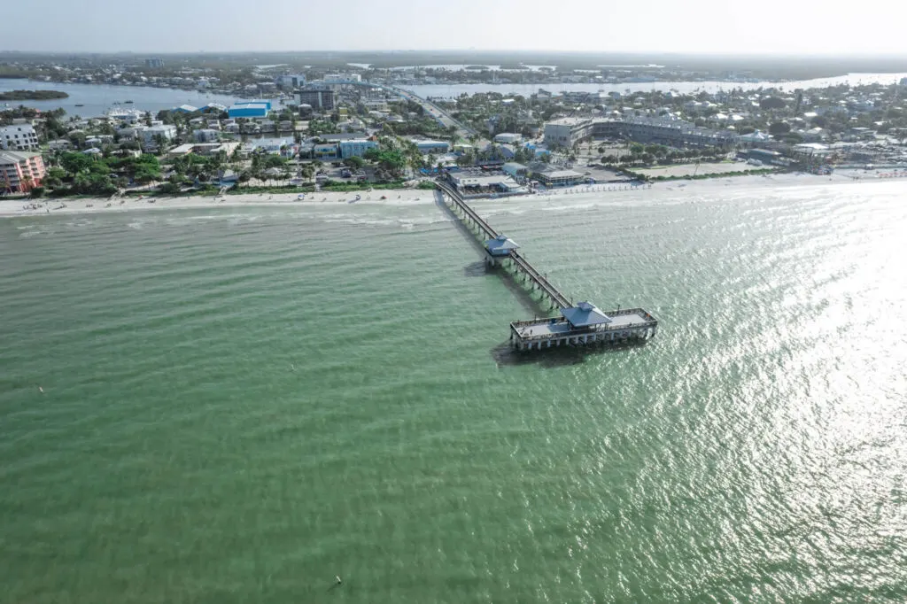 drone shot of fort myers beach pier