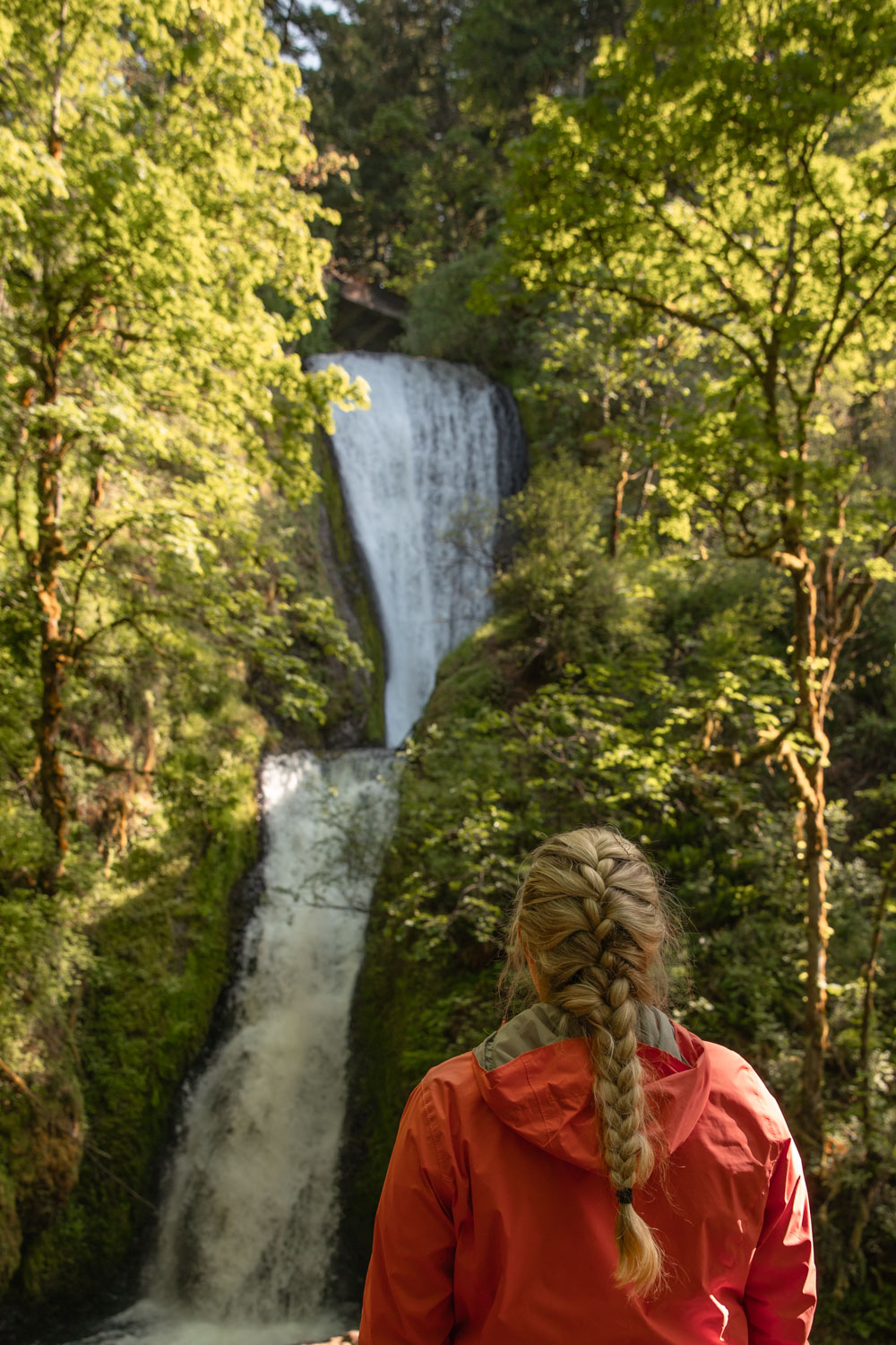 woman in front of Bridal Veil Falls in the Columbia River Gorge