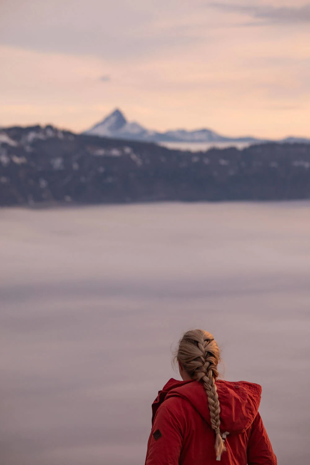 woman looking at mount thielsen in crater lake national park