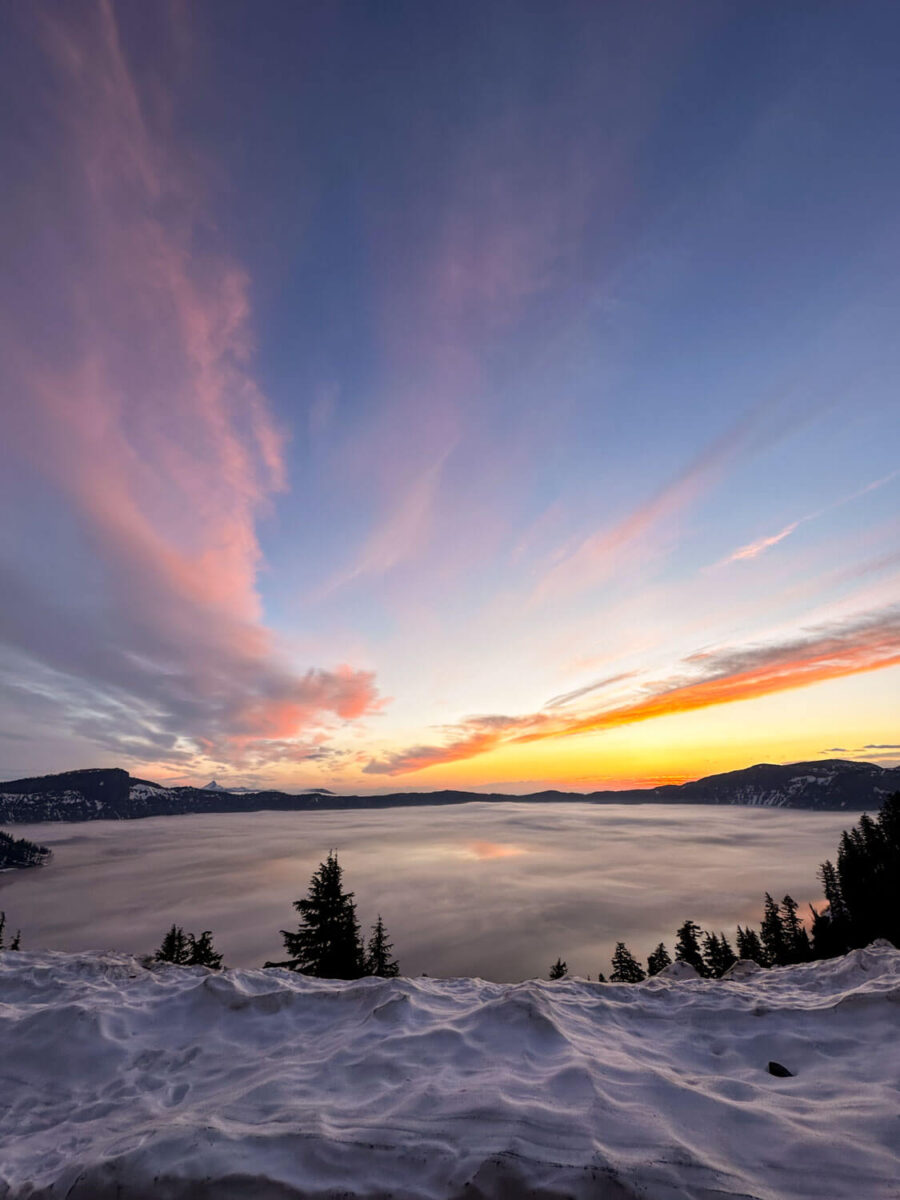 sunrise over crater lake national park in may